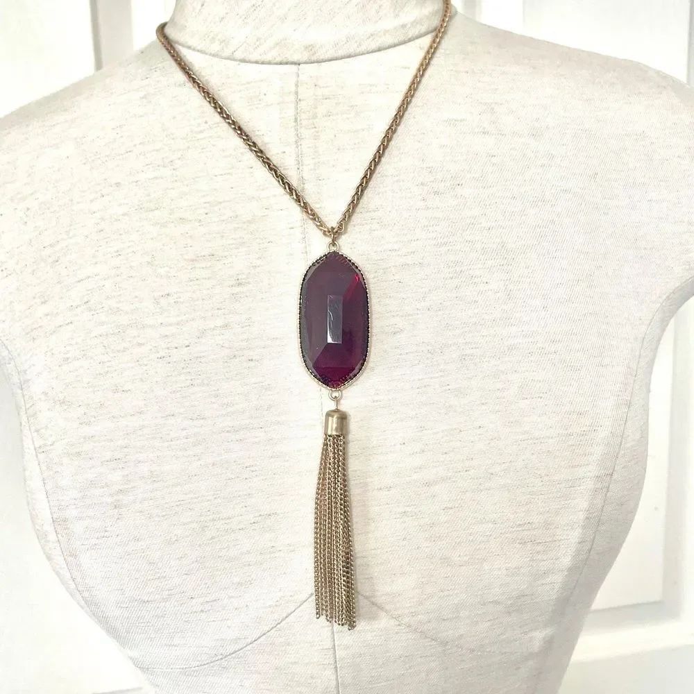 Gold tone red oval pendant chain tassel necklace